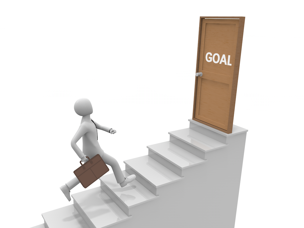 「GOAL」と書かれた扉へ続く階段を駆け上がるビジネスマンの無料イラスト。目標達成と成功を象徴。